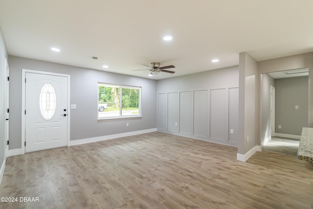 entrance foyer featuring light wood-type flooring and ceiling fan