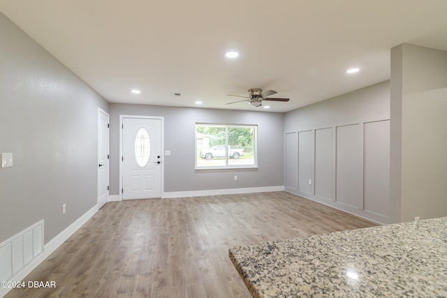 entryway featuring light hardwood / wood-style floors and ceiling fan