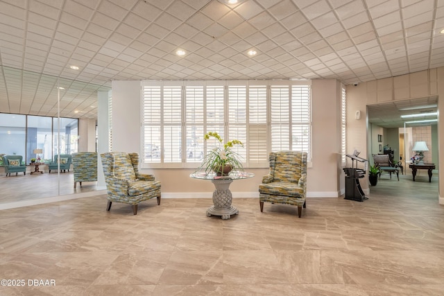 3047 S Atlantic Ave Unit 706, Daytona Beach Shores, FL 32118 - sitting room featuring baseboards