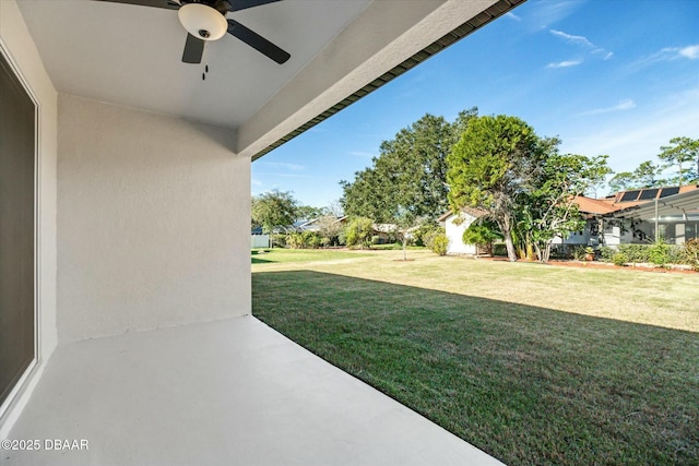 view of yard featuring ceiling fan