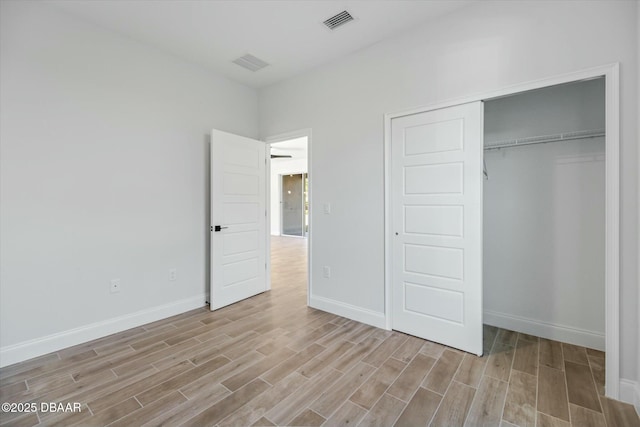 unfurnished bedroom featuring a closet