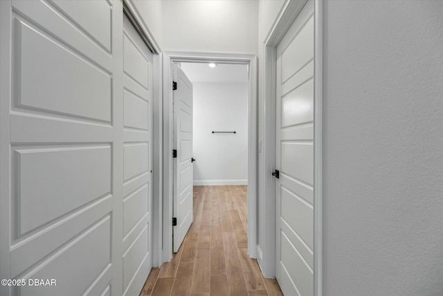 hallway featuring light hardwood / wood-style floors