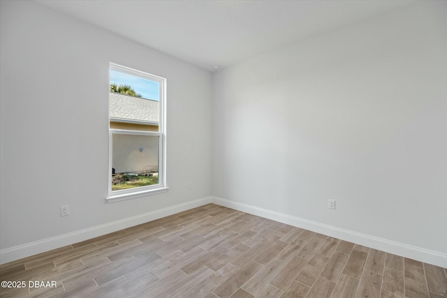 unfurnished room with a healthy amount of sunlight