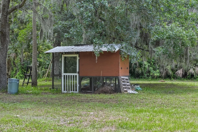 2950 Ragis Rd, Edgewater, FL 32132 - view of poultry coop featuring a yard