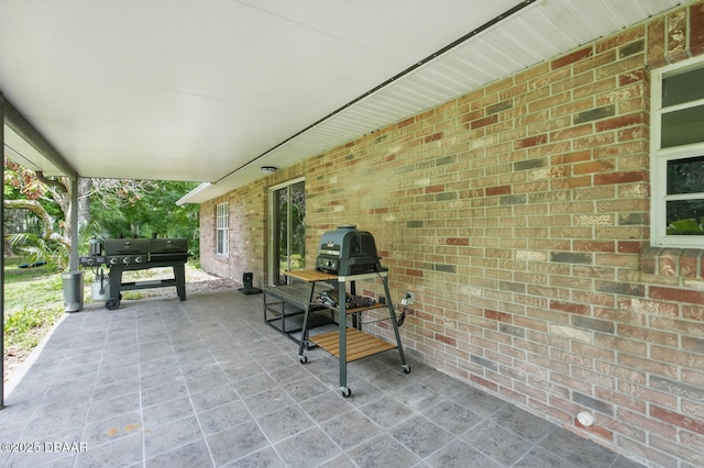 2950 Ragis Rd, Edgewater, FL 32132 - view of patio featuring area for grilling