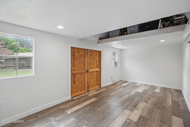 2950 Ragis Rd, Edgewater, FL 32132 - unfurnished bedroom featuring wood finished floors and recessed lighting