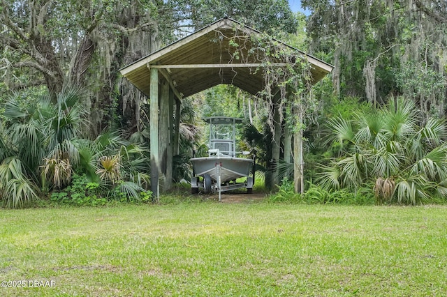 2950 Ragis Rd, Edgewater, FL 32132 - view of grassy yard featuring a carport