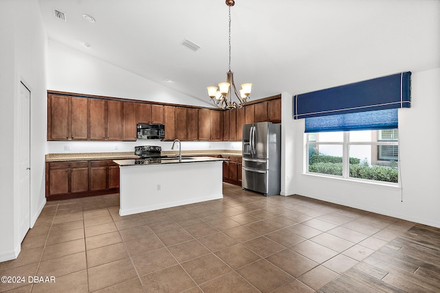 665 Elk River Dr, Ormond Beach, FL 32174 - kitchen featuring black appliances, high vaulted ceiling, pendant lighting, sink, and an island with sink