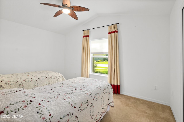665 Elk River Dr, Ormond Beach, FL 32174 - bedroom featuring ceiling fan, lofted ceiling, and light colored carpet