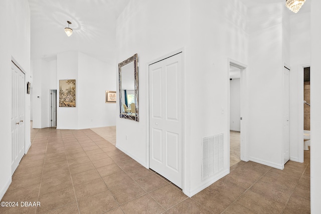 665 Elk River Dr, Ormond Beach, FL 32174 - hallway featuring light tile patterned floors