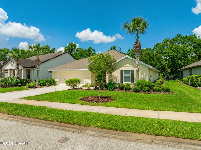 665 Elk River Dr, Ormond Beach, FL 32174 - ranch-style home with a garage and a front yard