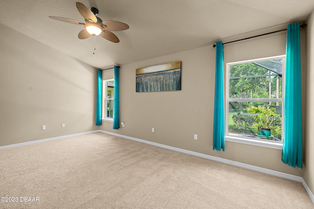 665 Elk River Dr, Ormond Beach, FL 32174 - carpeted spare room with a textured ceiling and ceiling fan