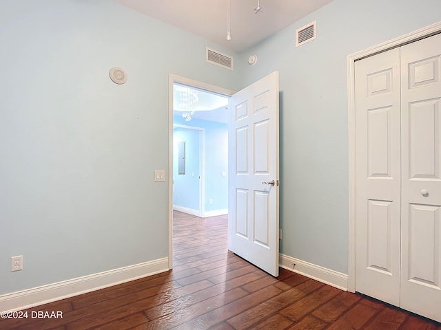 interior space with dark hardwood / wood-style floors