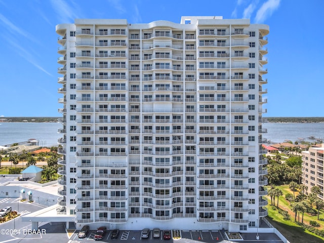 view of building exterior featuring a water view