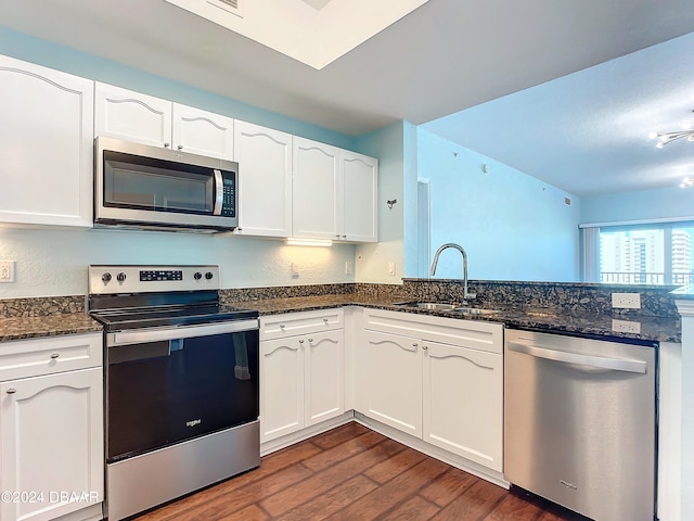 kitchen featuring white cabinetry, sink, and stainless steel appliances