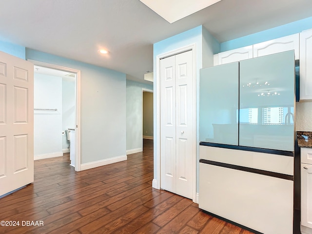 interior space with dark hardwood / wood-style floors