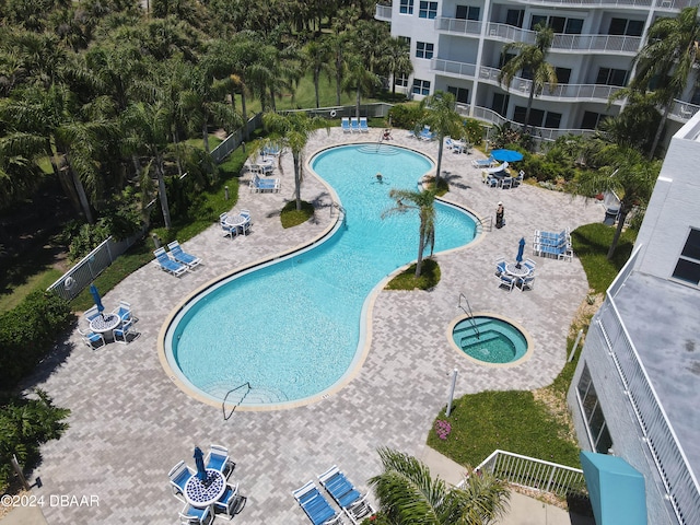 view of swimming pool with a patio