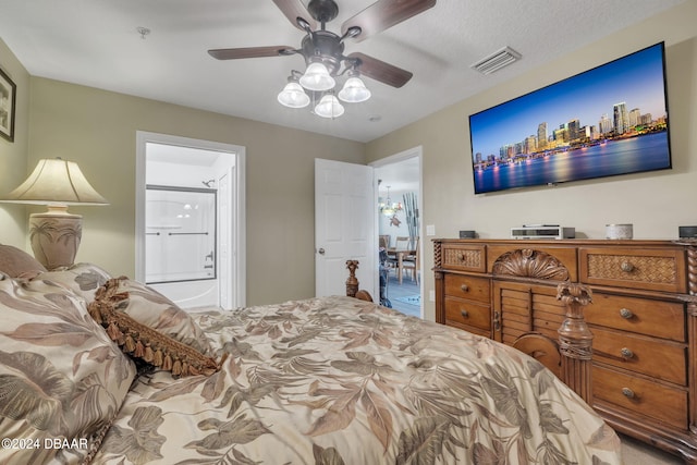 bedroom featuring connected bathroom, a textured ceiling, and ceiling fan