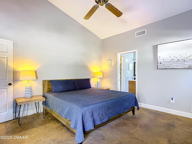 bedroom featuring ensuite bath, vaulted ceiling, and ceiling fan