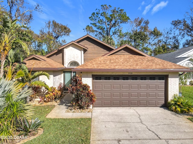 view of front of property with a garage