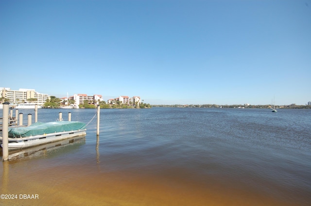 view of dock with a water view