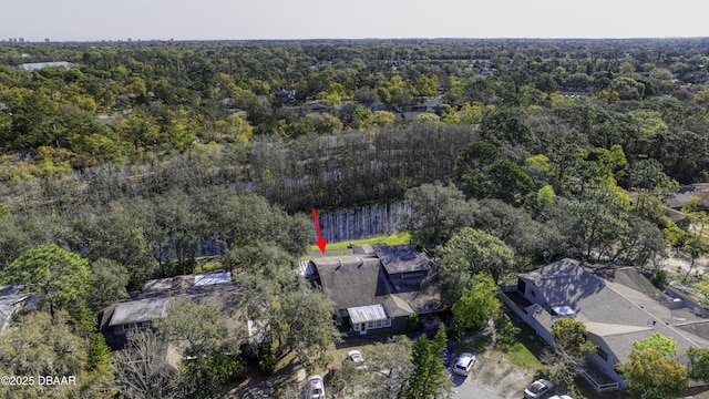 drone / aerial view with a view of trees