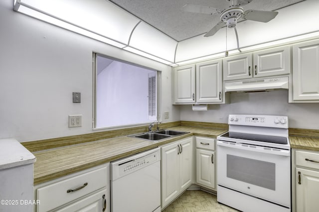 kitchen with under cabinet range hood, a sink, white appliances, light countertops, and ceiling fan