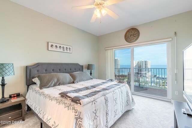 carpeted bedroom with access to outside and ceiling fan