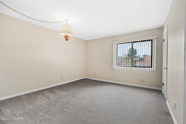 view of carpeted spare room