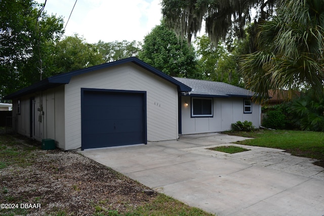 ranch-style home with a garage