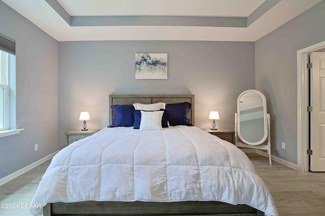 bedroom featuring wood-type flooring