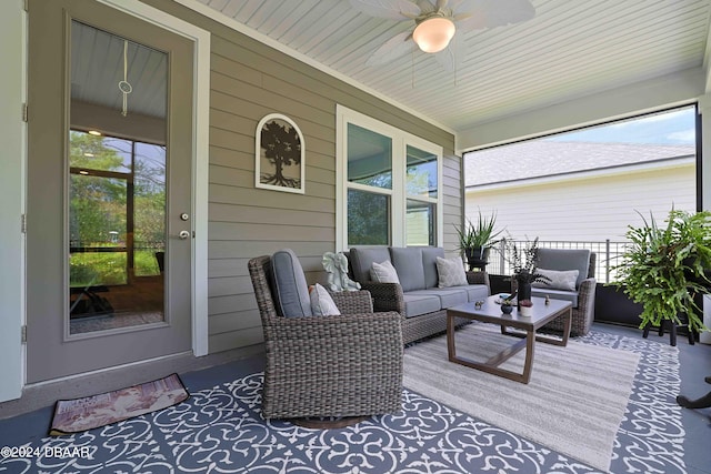 deck featuring outdoor lounge area and ceiling fan