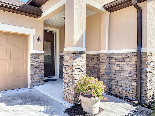 property entrance with a garage