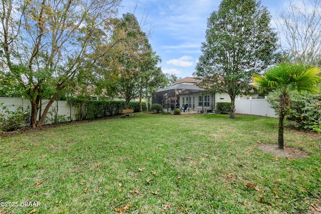 view of yard with a lanai