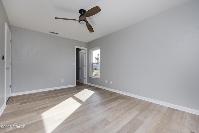 unfurnished bedroom featuring ceiling fan and light hardwood / wood-style flooring