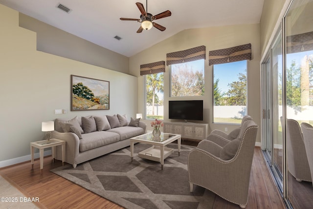 living room featuring ceiling fan, wood-type flooring, and lofted ceiling