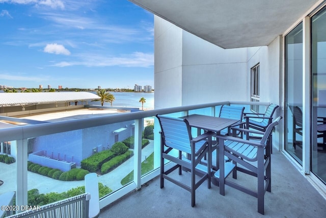 241 Riverside Dr Unit 410, Holly Hill, FL 32117 - balcony featuring a water view