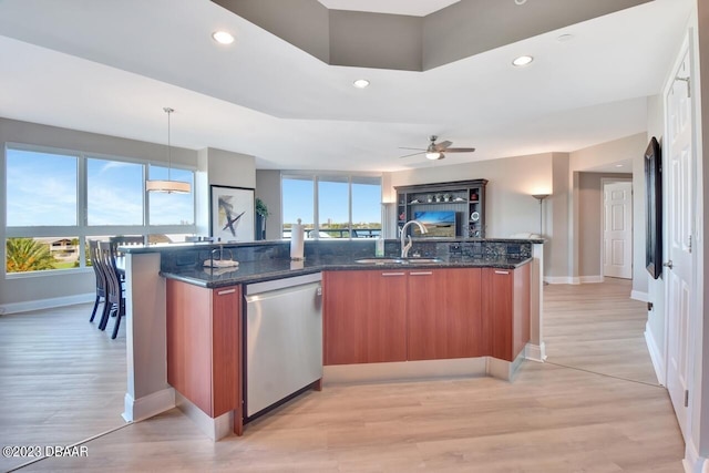 241 Riverside Dr Unit 410, Holly Hill, FL 32117 - kitchen featuring dishwasher, a sink, recessed lighting, open floor plan, and a kitchen island with sink