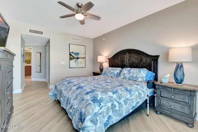 241 Riverside Dr Unit 410, Holly Hill, FL 32117 - bedroom with light wood-style flooring, baseboards, and ceiling fan