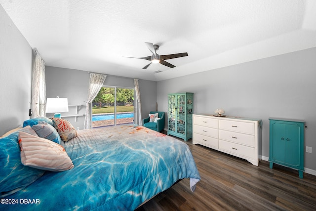 bedroom featuring dark wood-type flooring, ceiling fan, a textured ceiling, and access to outside