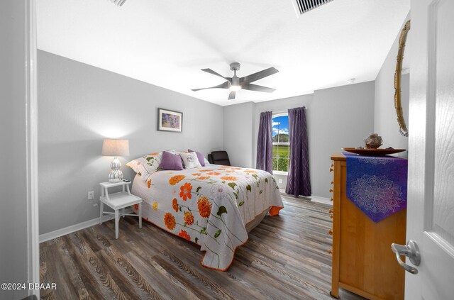 1934 NW 79th Loop, Ocala, FL 34475 - bedroom featuring wood finished floors, baseboards, and ceiling fan