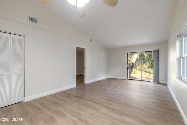 empty room with light hardwood / wood-style flooring and ceiling fan