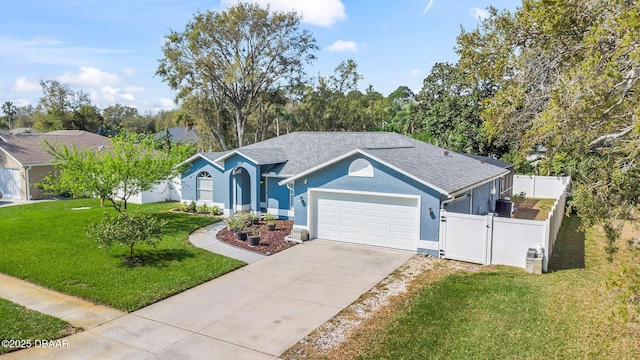 ranch-style house featuring fence, a front yard, stucco siding, a garage, and a gate