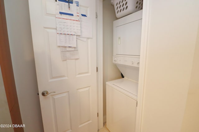 231 Riverside Dr Unit 1106-1, Holly Hill, FL 32117 - laundry area with estacked washer and dryer