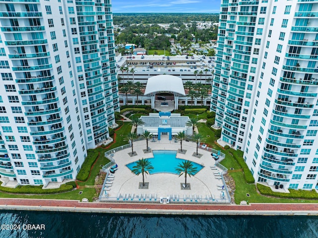 231 Riverside Dr Unit 1106-1, Holly Hill, FL 32117 - bird's eye view of a pool and apartment complex