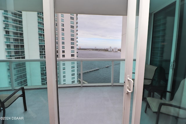 231 Riverside Dr Unit 1106-1, Holly Hill, FL 32117 - balcony featuring a water view and a view of city