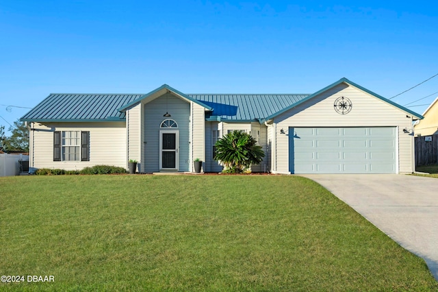 single story home with a garage and a front lawn