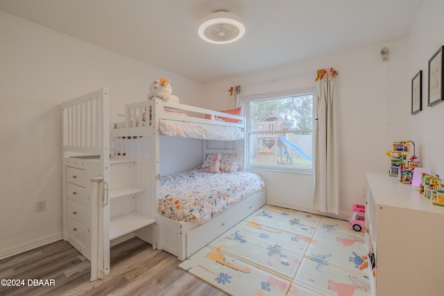 bedroom with light wood-type flooring