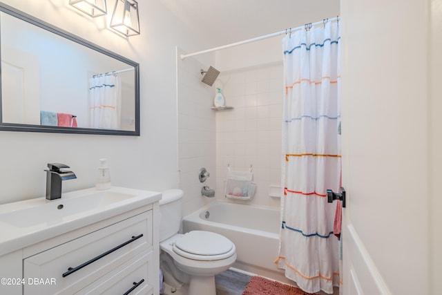 full bathroom featuring toilet, vanity, and shower / bath combination with curtain