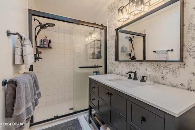 bathroom with vanity and an enclosed shower